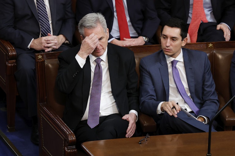 Representative Kevin McCarthy holds a hand to his forehead