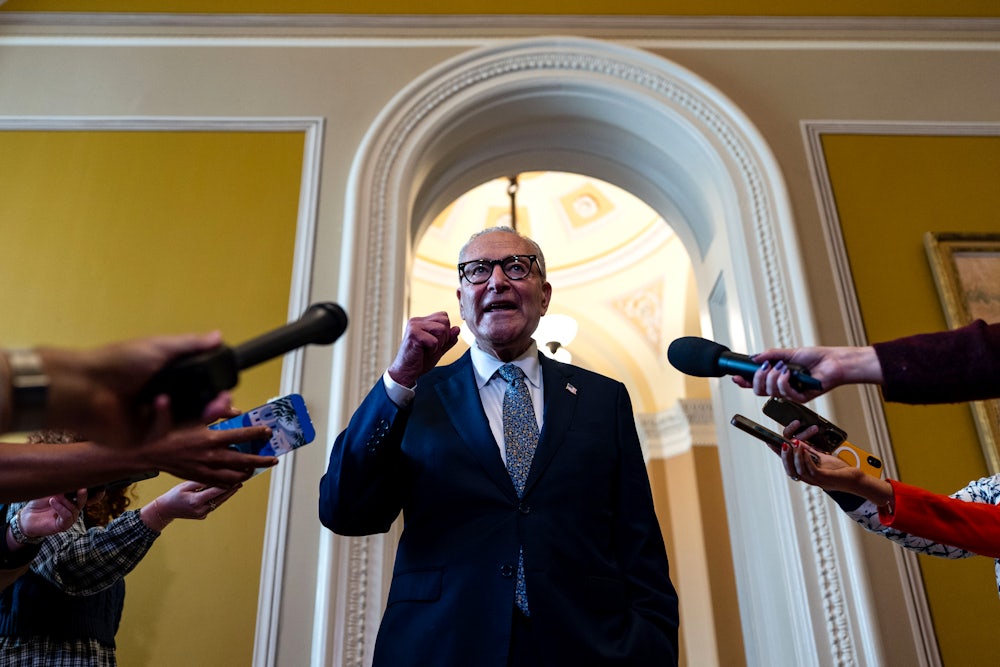 Chuck Schumer speaks with reporters outside of the Senate Chamber at the U.S. Capitol.