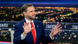 Vice President JD Vance holds up his hands while sitting on the set of Hannity
