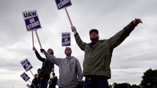 Striking workers picket outside of the John Deere Davenport Works facility on October 15, 2021 in Davenport, Iowa.