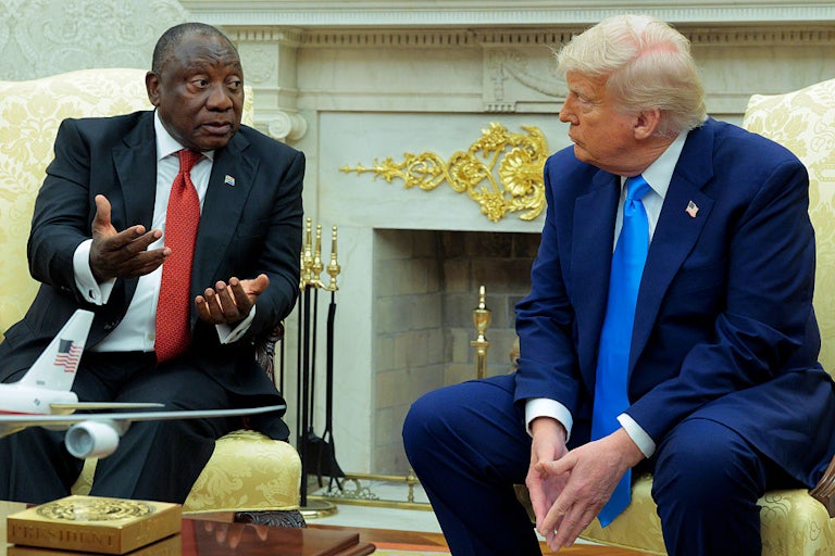 South African President Cyril Ramaphosa speaks with President Trump in the Oval Office of the White House.