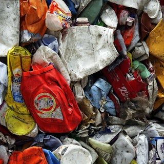 Flattened plastics are bunched together.