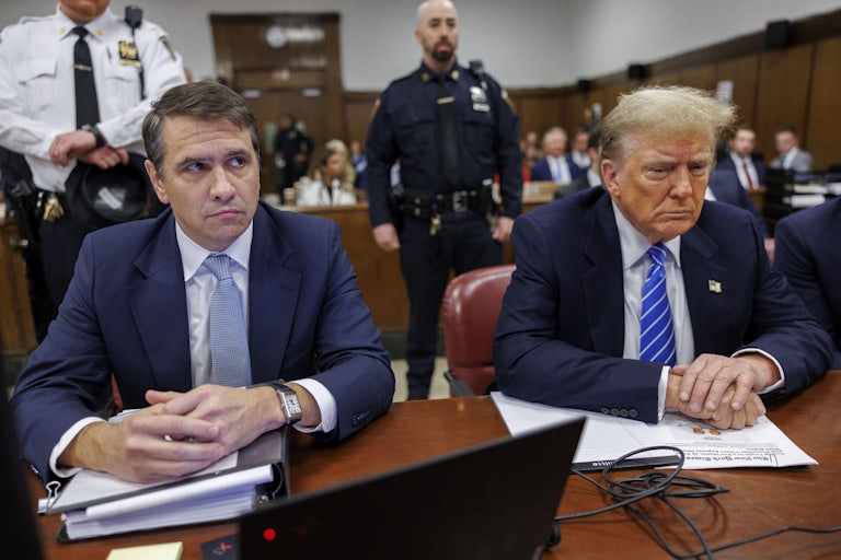 Todd Blanche and Donald Trump sit in court