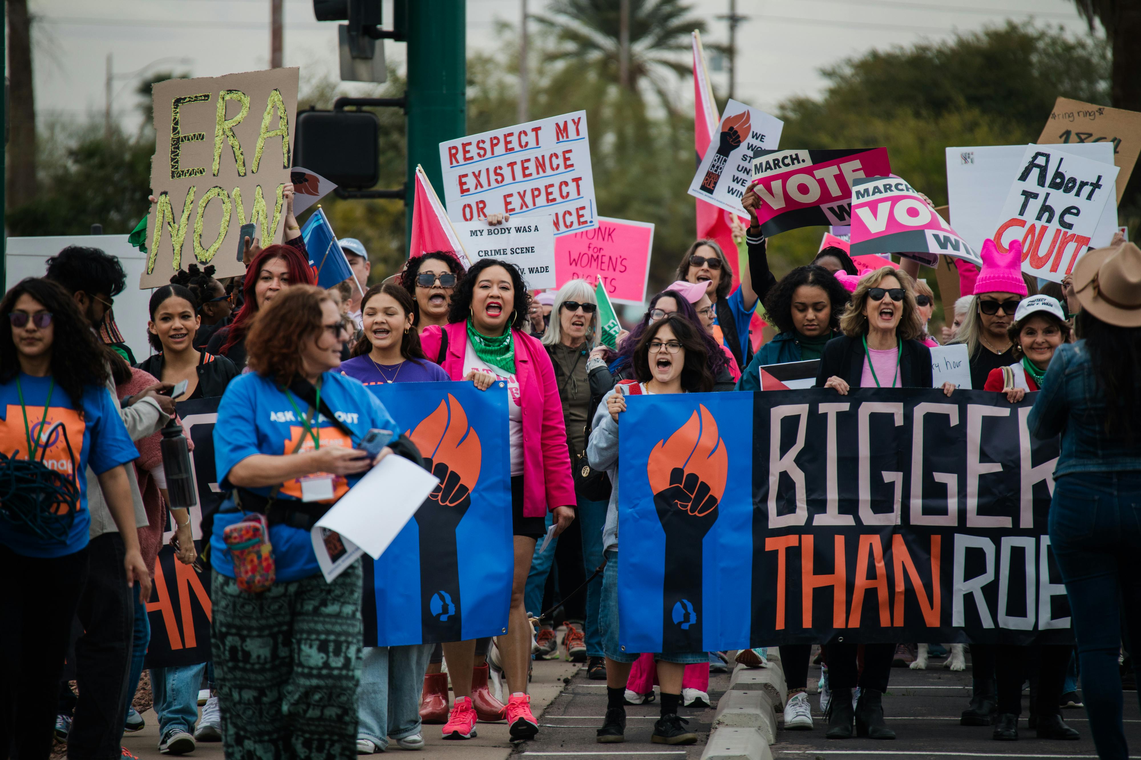 Demonstrators hold pro-choice signs.