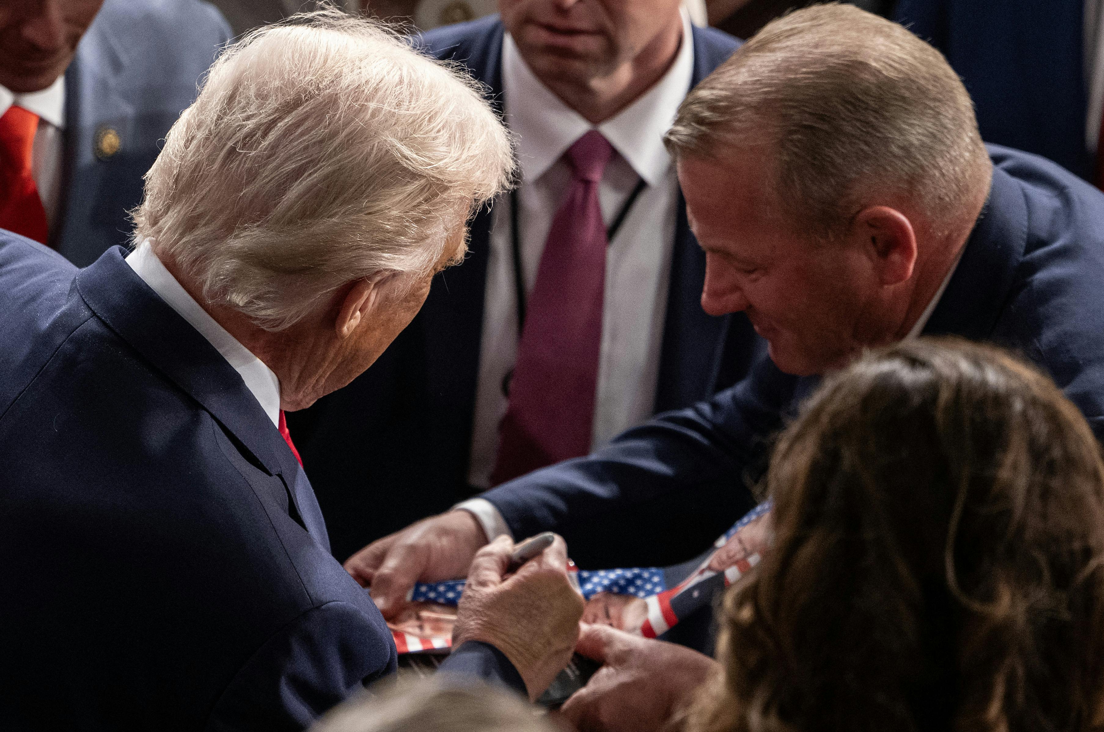 Donald Trump signs Representative Troy Nehls's tie