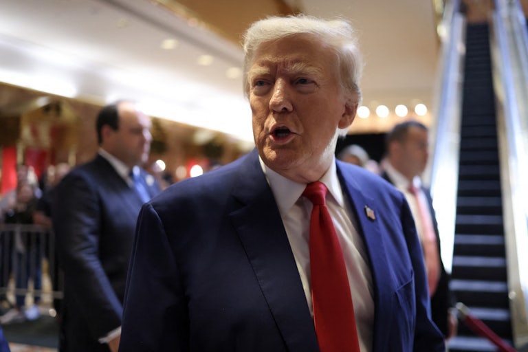 Donald Trump speaks ahead of a speech to press