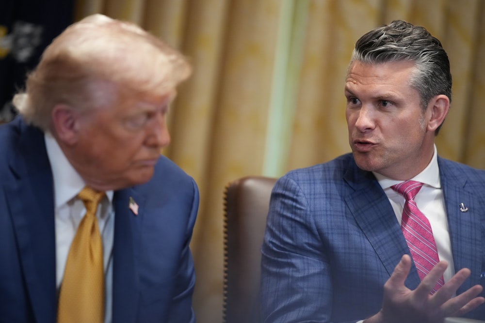 President Donald Trump speaks with Defense Secretary Pete Hegseth in Washington, DC, on July 08, 2025.