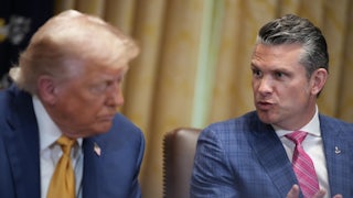 President Donald Trump speaks with Defense Secretary Pete Hegseth in Washington, DC, on July 08, 2025.
