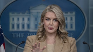 White House press secretary Karoline Leavitt gestures while speaking at a podium