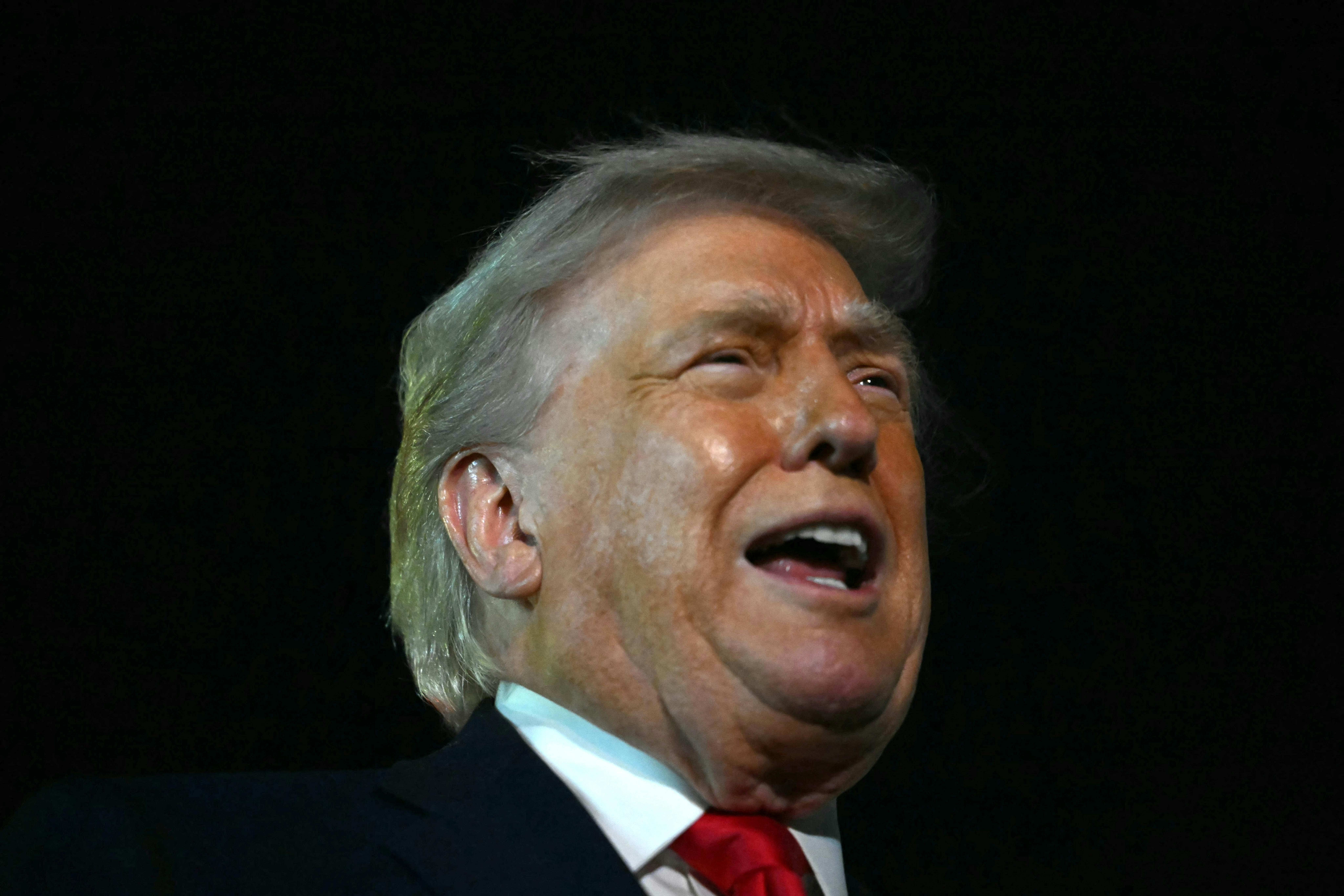Donald Trump speaks vehemently with open mouth