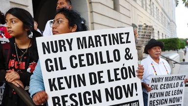 Protesters call for the resignation of three Los Angeles City Councilmembers after the public disclosure of a profanity-laced recording which revealed racist comments amid a discussion of city redistricting.
