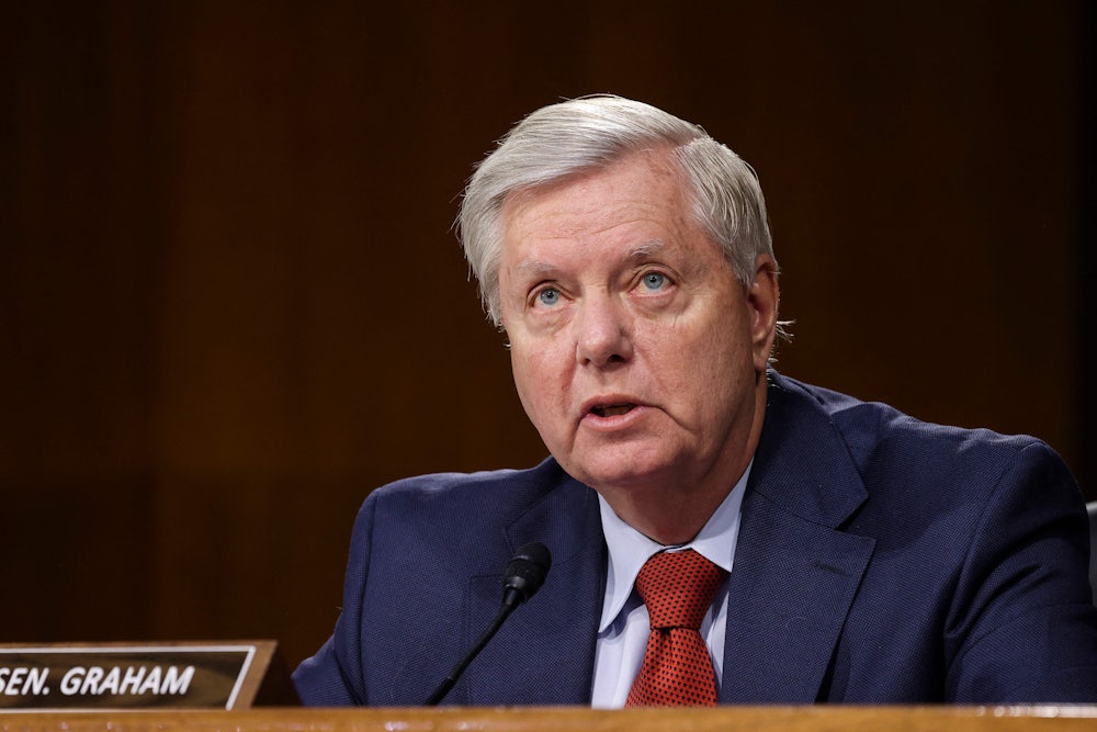 A close-up of Senator Lindsey Graham during a Senate hearing.