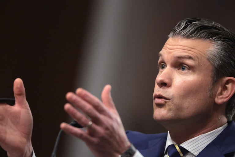 Defense Secretary Pete Hegseth gestures while speaking during a Senate hearing