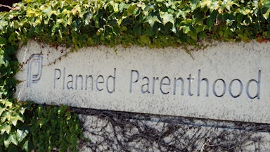 A sign is posted in front of a Planned Parenthood health center on June 26, 2025 in San Rafael, California