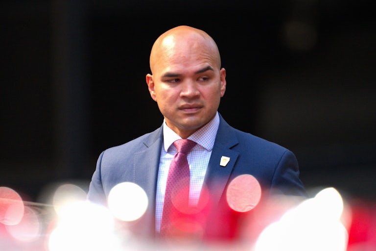 Walt Nauta raises one eyebrow and looks off camera