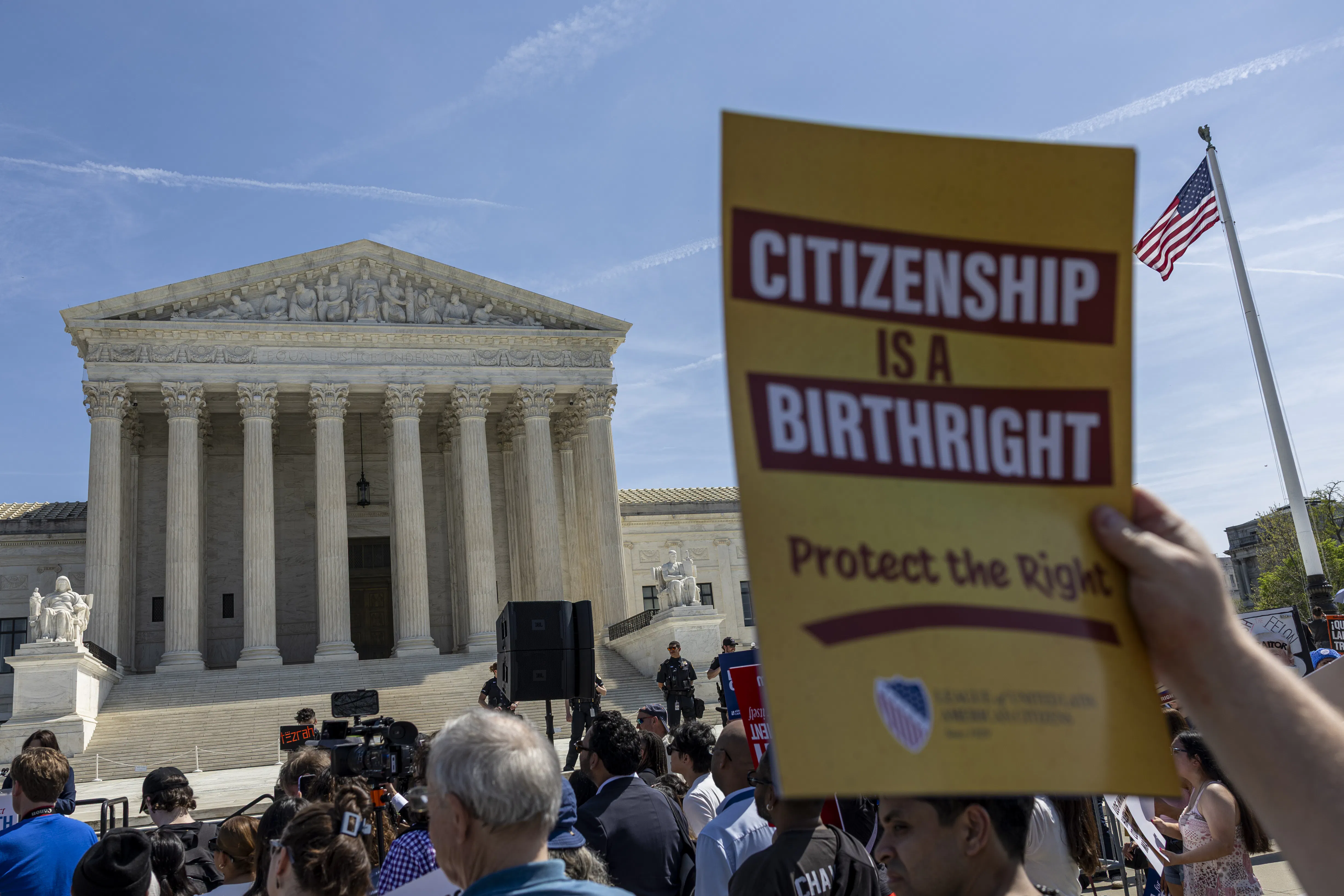 People protest in support of birthright citizenship outside the Supreme Court