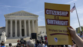 People protest in support of birthright citizenship outside the Supreme Court