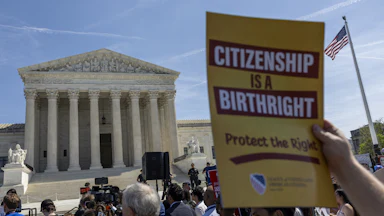People protest in support of birthright citizenship outside the Supreme Court