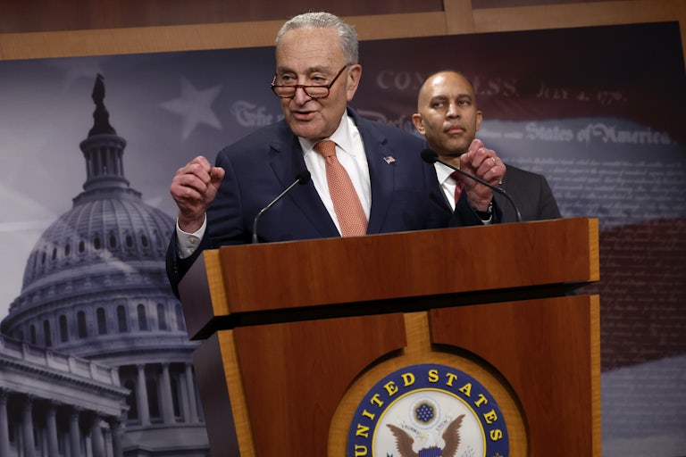 Senate Minority Leader Charles Schumer House Minority Leader Hakeem Jeffries speak at a press conference.