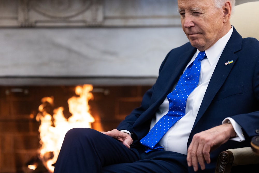 Joe Biden sitting by the fireplace in the White House early 2024.