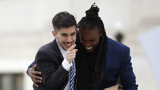 Lawyer and transgender rights activist Chase Strangio (L) and ACLU Deputy Executive Director AJ Hikes leave the Supreme Court after arguments in U.S. v. Skrmetti