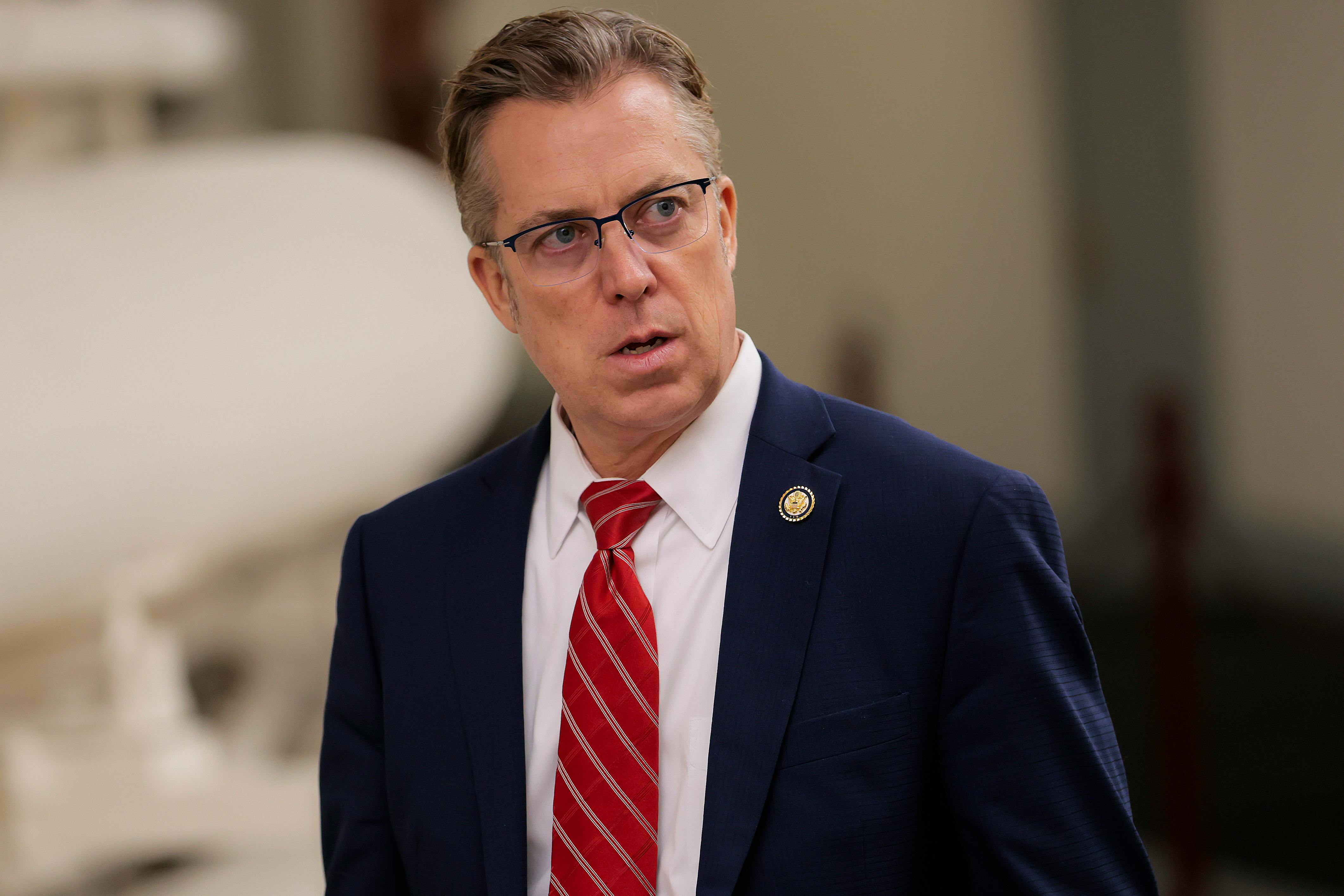 Representative Andy Ogles with his mouth open.