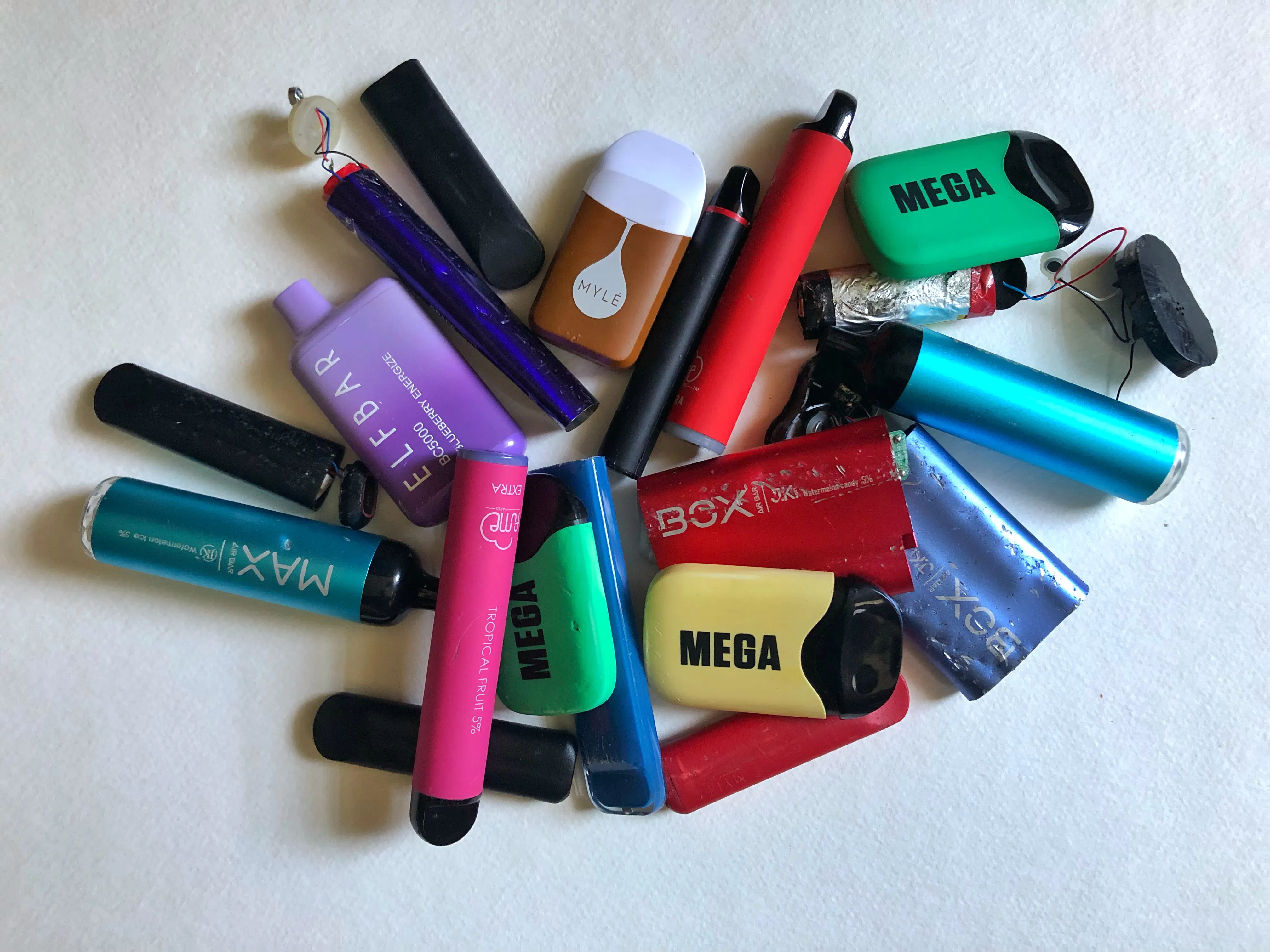 Pile of colorful vapes