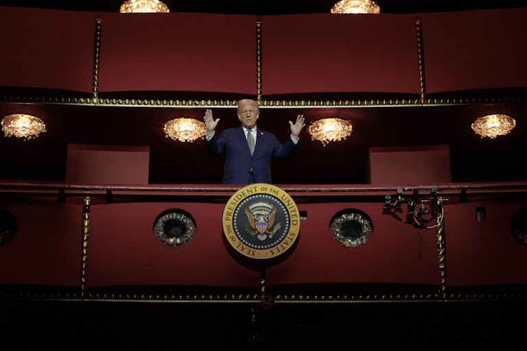 Donald Trump gestures while speaking from the Presidential Box in the Opera House at the Kennedy Center