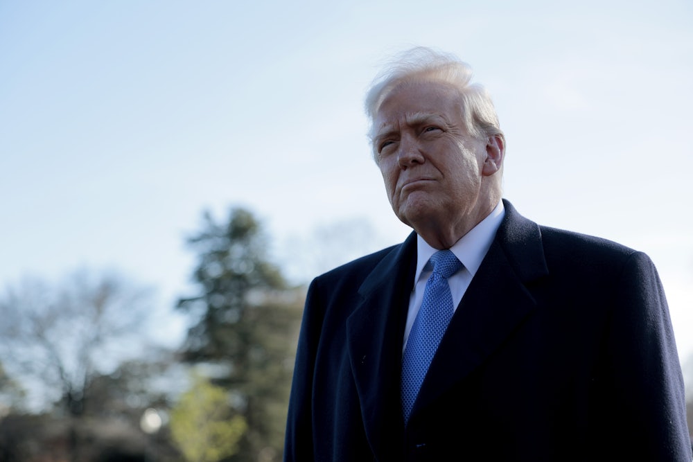 Donald Trump speaks to reporters before boarding Marine One at the White House.