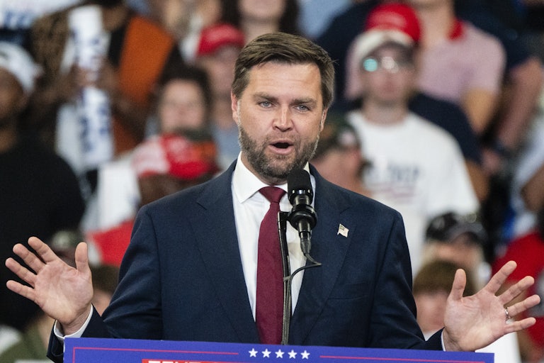 J.D. Vance gestures while speaking at a Donald Trump campaign event