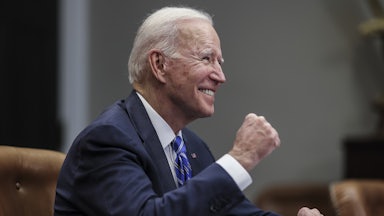 President Joe Biden celebrates with a fist pump at the White House.