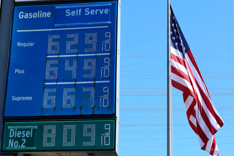 High gas prices are displayed at a Chevron gas station (6.29 for regular)