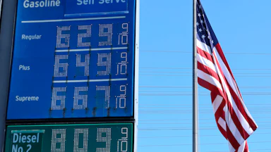 High gas prices are displayed at a Chevron gas station (6.29 for regular)