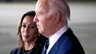 Kamala Harris watches Joe Biden speak to reporters after the Russian prisoner exchange
