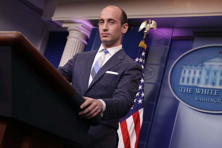 Stephen Miller standing at the podium in the White House briefing room