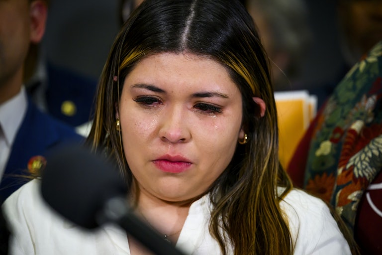 Kilmar Abrego Garcia's wife Jennifer Vasquez Sura cries during a press conference held by Senator Chris Van Hollen