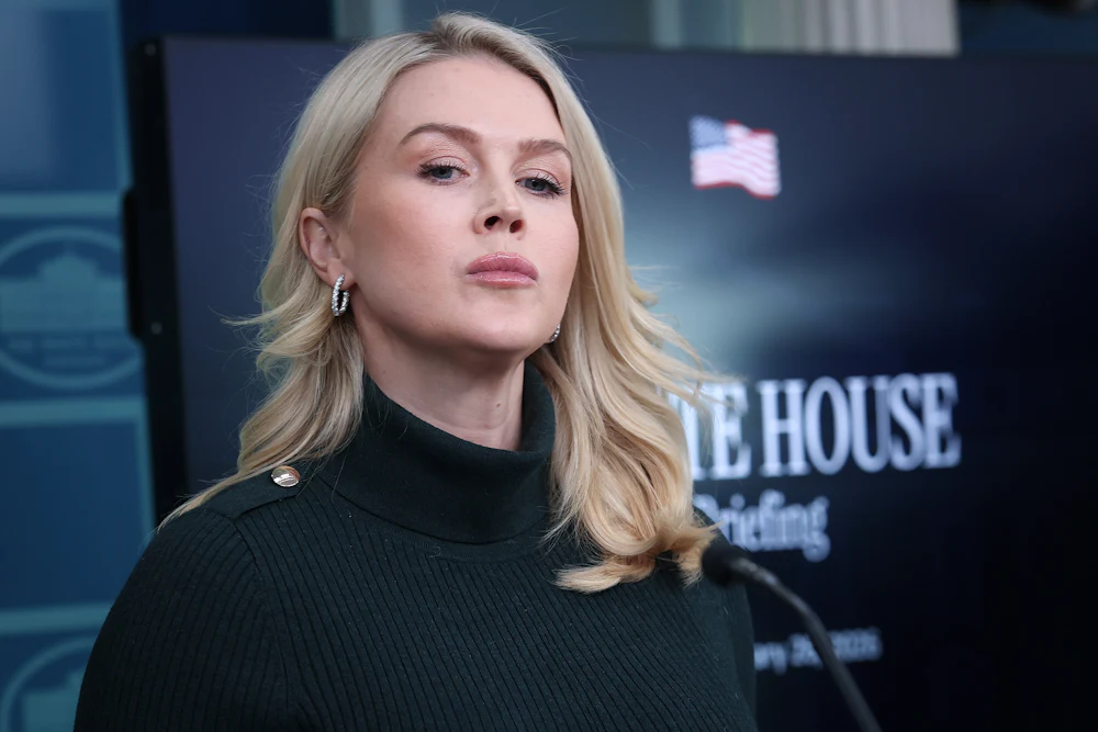 White House press secretary Karoline Leavitt purses her lips during a press briefing