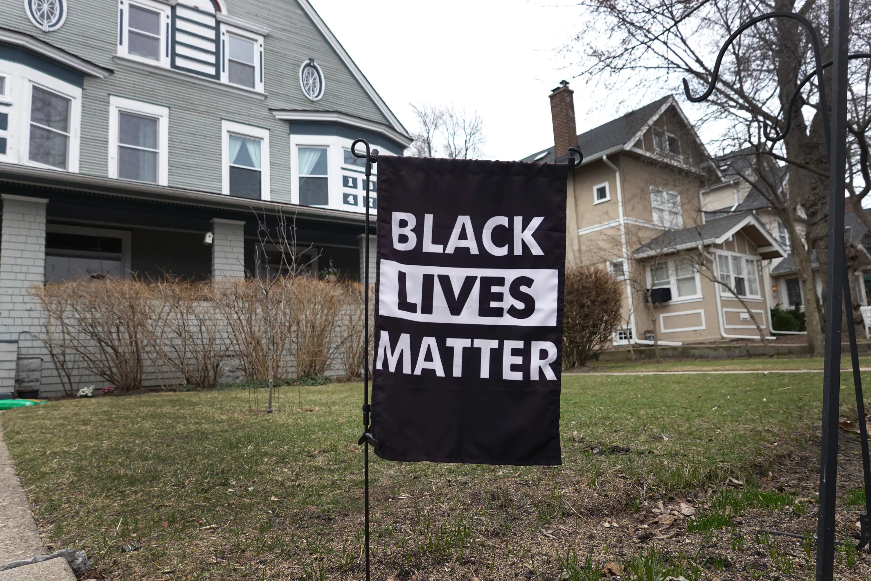 Black Lives Matter sign in someone's front lawn