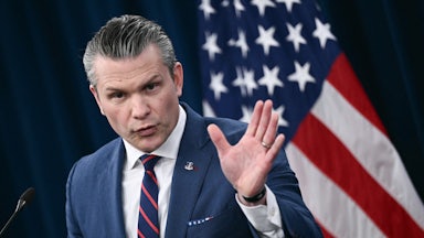Defense Secretary Pete Hegseth makes a weird face during a press conference