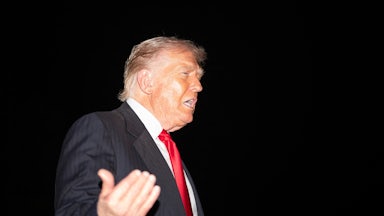 Donald Trump gestures while speaking