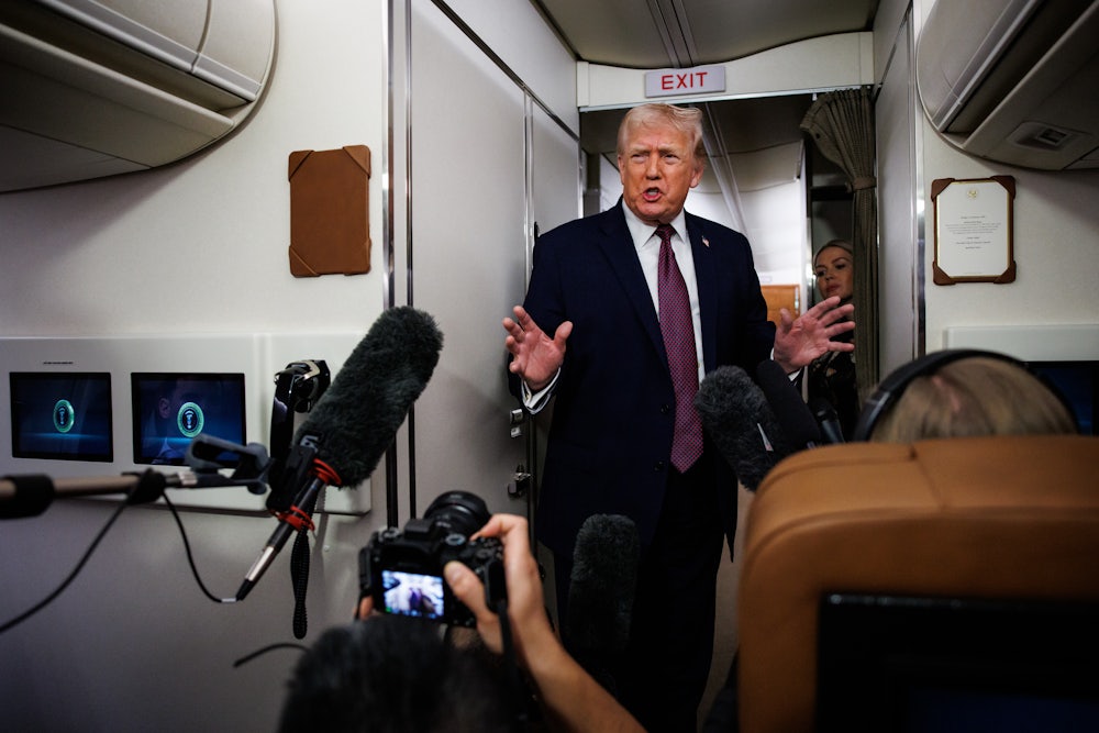 Trump speaking to reporters on Air Force One