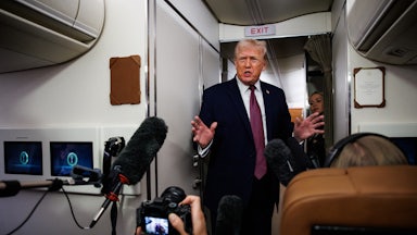 Trump speaking to reporters on Air Force One