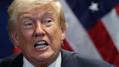 Donald Trump speaks during a press conference at a NATO summit