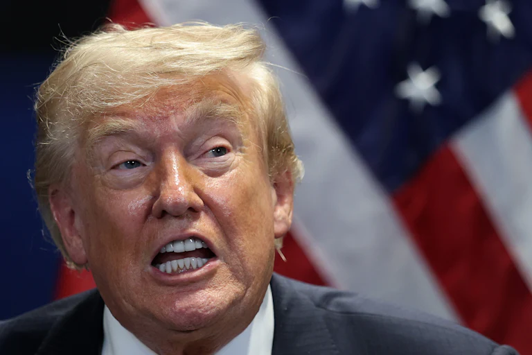 Donald Trump speaks during a press conference at a NATO summit