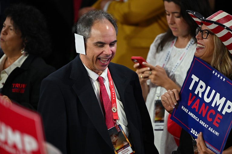 Arizona delegate Joe Neglia wears a paper “bandage” to imitate Donald Trump at the Republican National Convention
