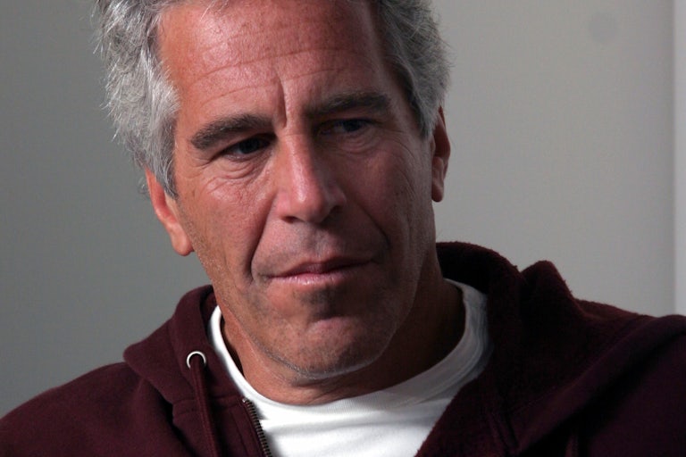 Jeffrey Epstein wearing a Harvard sweater