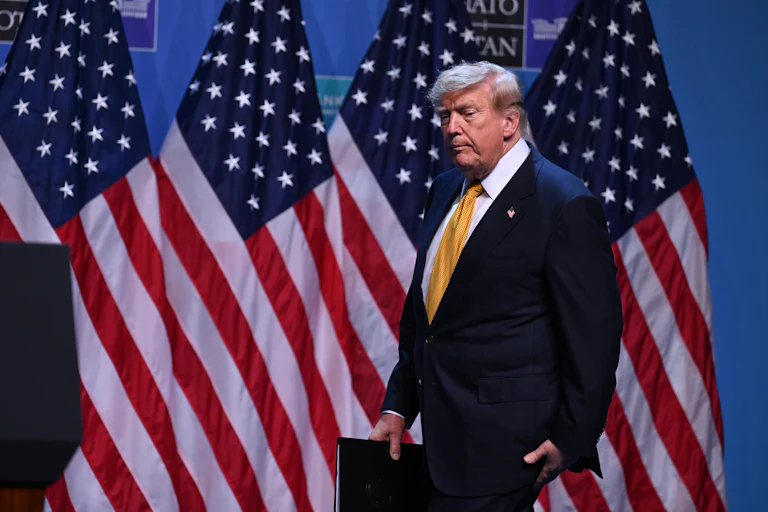 Donald Trump walks onstage ahead of a press conference at the NATO summit in Ankara, Turkey.