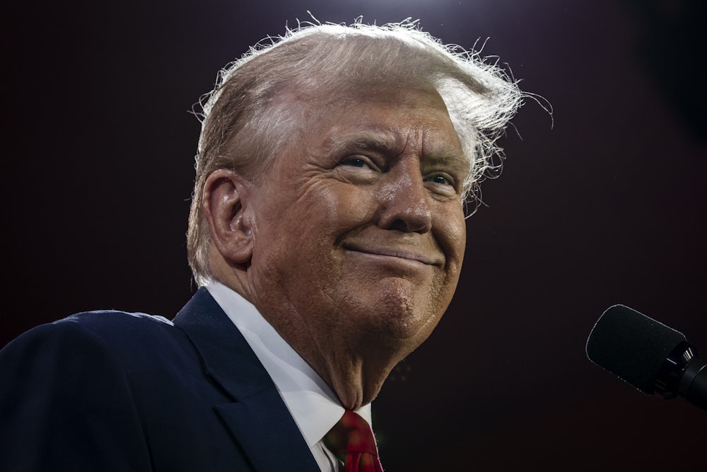 Donald Trump speaks at a mic
