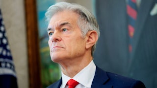 Mehmet Oz stands in the Oval Office