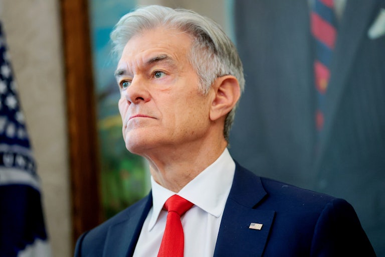 Mehmet Oz stands in the Oval Office